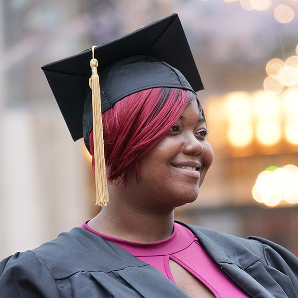 CUNY SPS Graduate Smiling