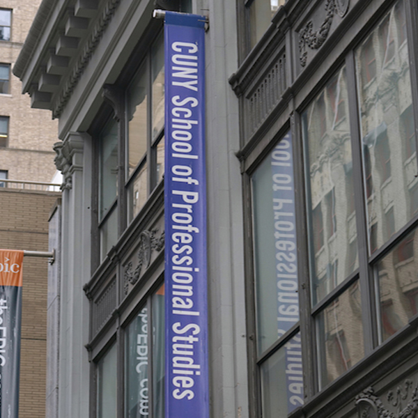 CUNY SPS logo on a banner on the building 