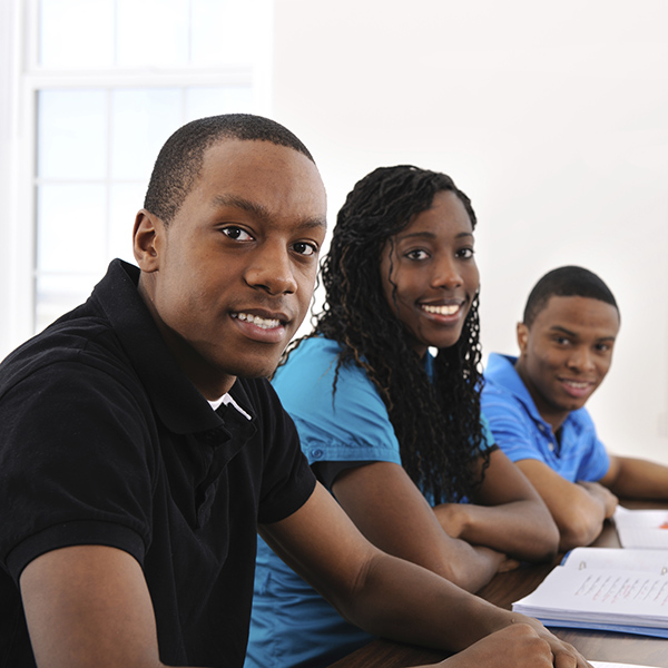 Group of young students in classroom