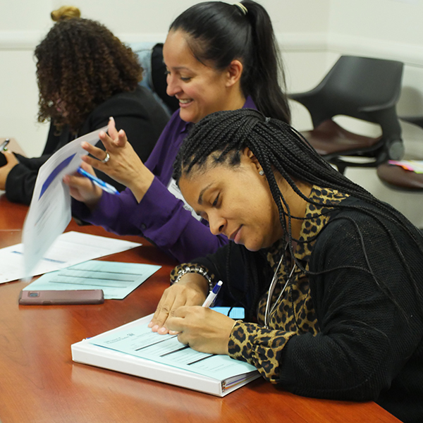 PEWL staff at on-campus event