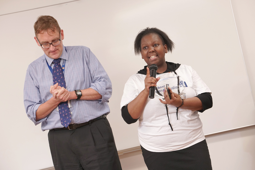  Woman accepting award at the annual Spring Reception