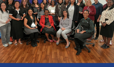 CUNY SPS Years of Services awardees in a group shot with Dean Lisa R. Braverman and HR Benefits Manager Kimesha Johnson