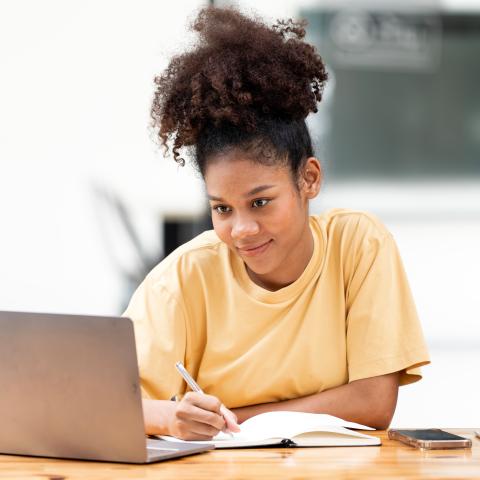 young african american student working online