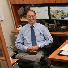 CUNY SPS Student in Office Intelligent Best Online-Master's In Management Programs