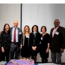cuny-sps-foundation-board-with-anniversary-cake.jpg