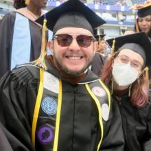 CUNY SPS Alum Sarah Meister and Helio Sepulveda Zornosa at 2022 Commencement