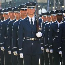 Uniformed soldiers in military parade