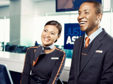 A female and male airline customer reps