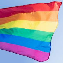 the-lgbt-rainbow-flag-is-waving-against-the-sky