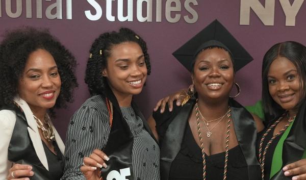 A group of happy graduates at the CUNY SPS Black Student Union hosted 2025 Black Graduation Ceremony