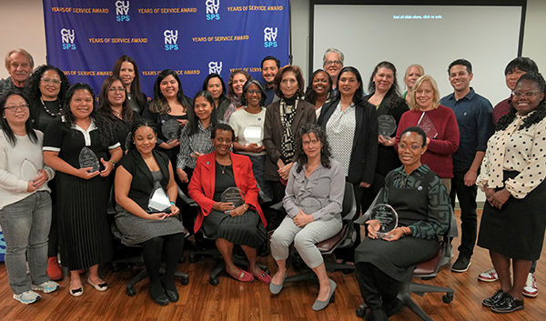 CUNY SPS Years of Services awardees in a group shot with Dean Lisa R. Braverman and HR Benefits Manager Kimesha Johnson