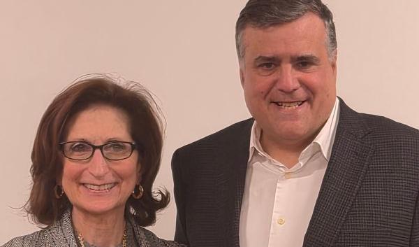 CUNY SPS Dean Braverman with Award-Winning Professor Curtis Izen